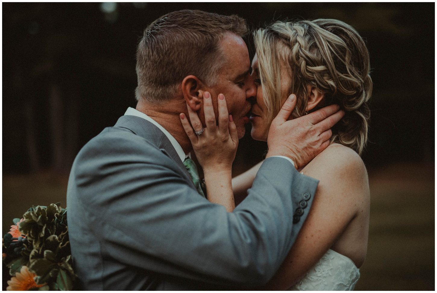 Pontiac wedding groom + bride kiss