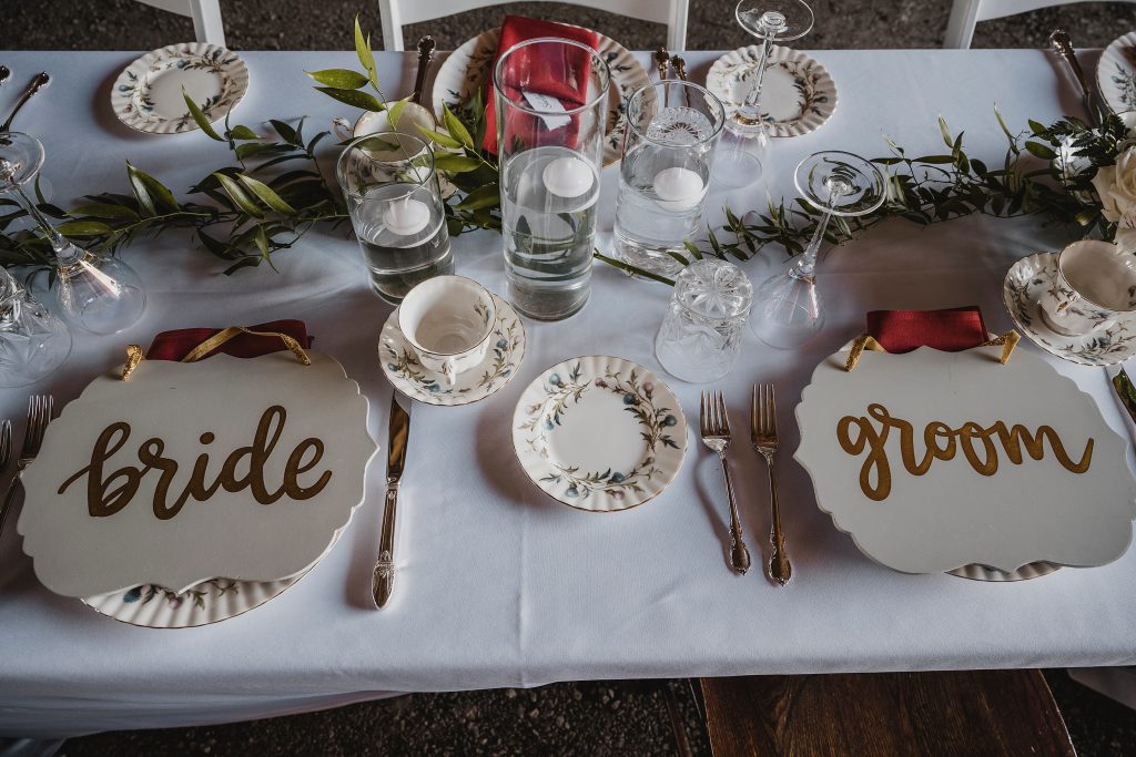 Barn wedding tablescape vintage dinnerware