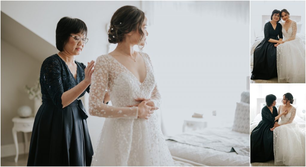 A mother of the bride helping her daughter get dressed on the wedding day