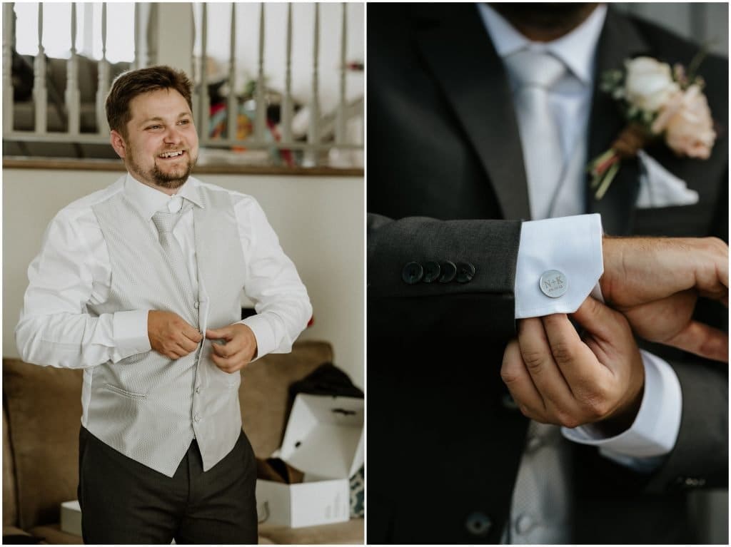 A smiling groom buttons up his vest and shows off his custom cufflinks on his wedding day. Photo by Cindy Lottes Photography